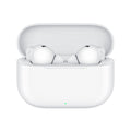 White wireless earbuds in a charging case on a white background