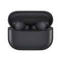 Black wireless earbuds in a charging case on a white background